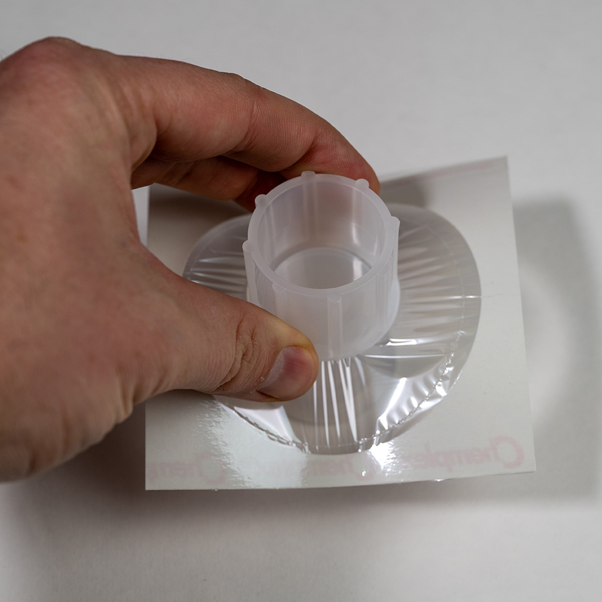 Thermo Scientific ARL QUANT'X Mylar Film Carrier Frame for EDXRF or XRF Applications showing cup application