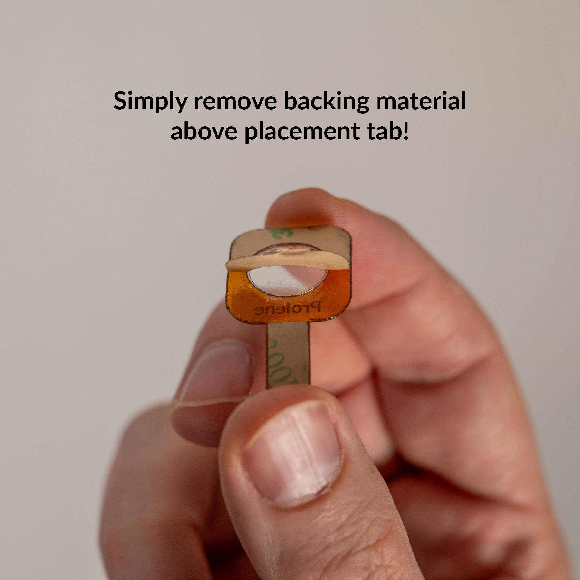 SciAps X-Series Stick-On Prolene Window showing backing removal