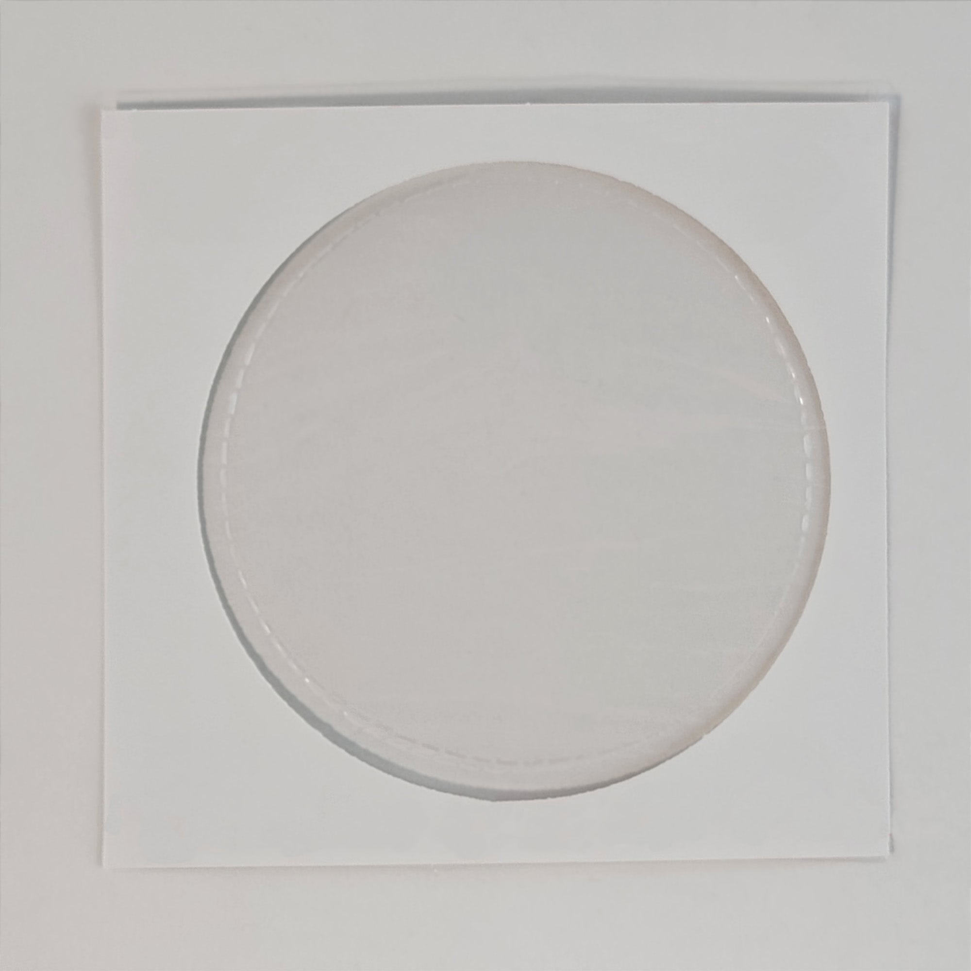 Thermo Scientific ARL QUANT'X Prolene Film Carrier Frame for EDXRF or XRF Applications showing carrier frame with perforated edge