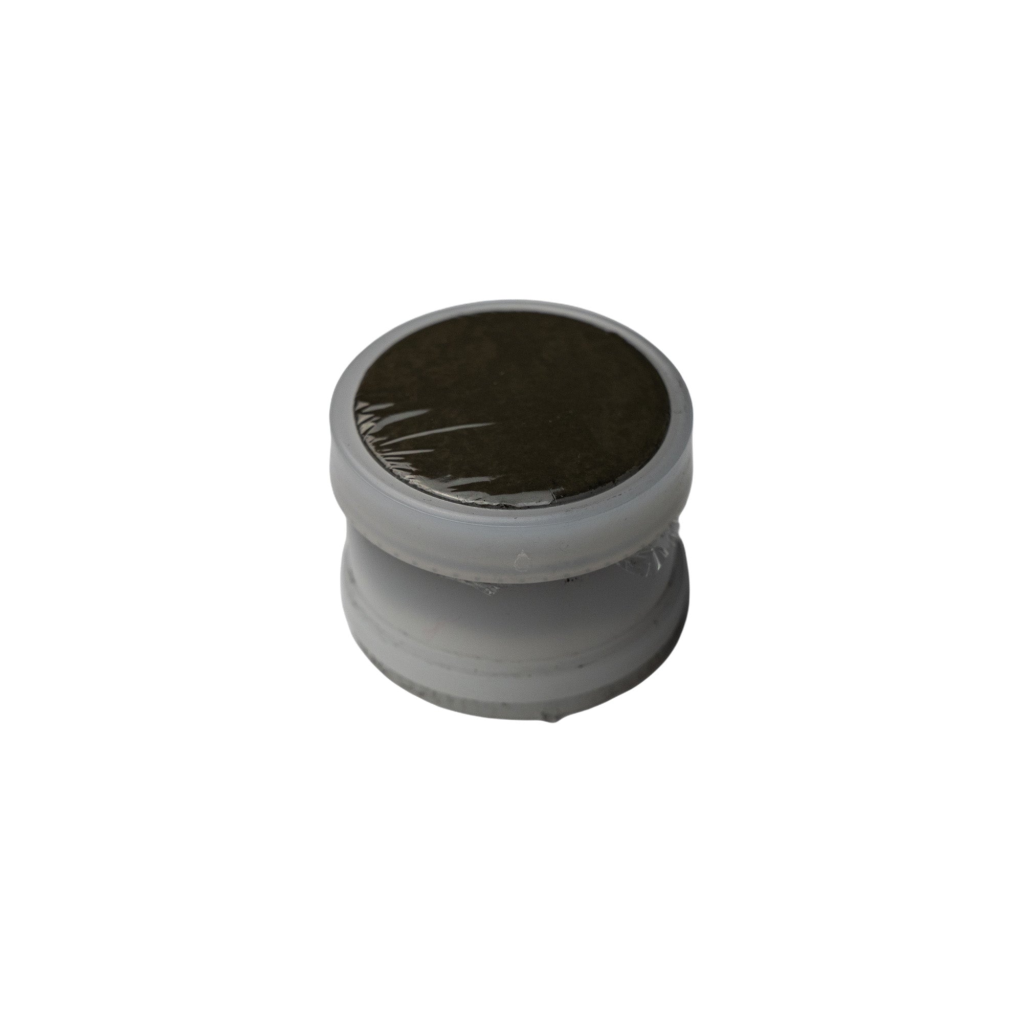 Oreas 996 prepared for handheld XRF analysis in sample cup with x-ray foil