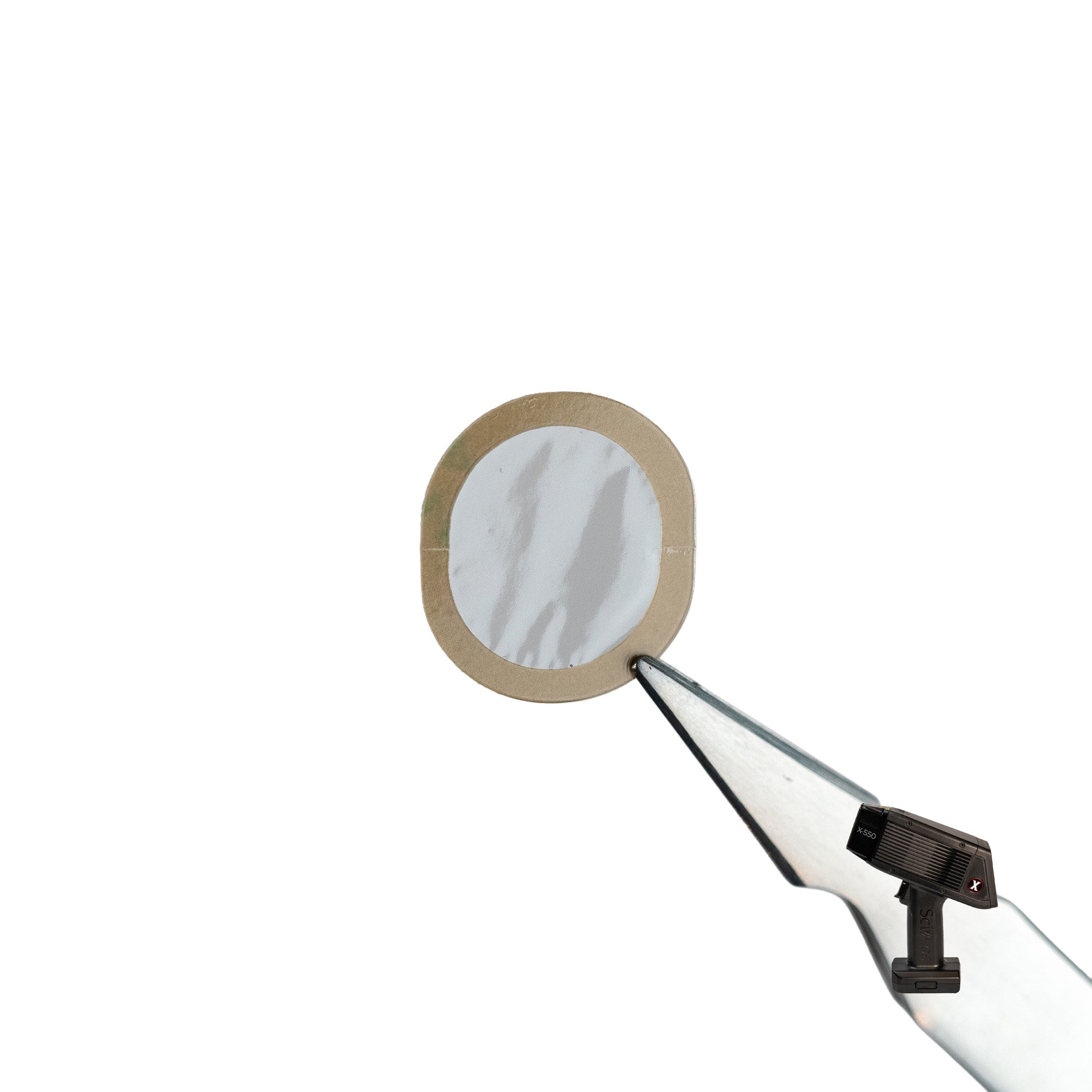 SciAps X-550 Prolene window shown held by a tweezer