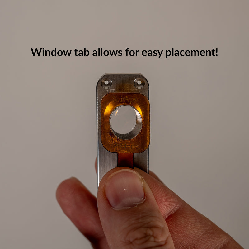 SciAps X-Series Stick-On Prolene Window showing easy alignment with pull tab
